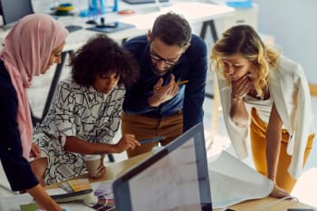 Our diverse team collaborating on solutions